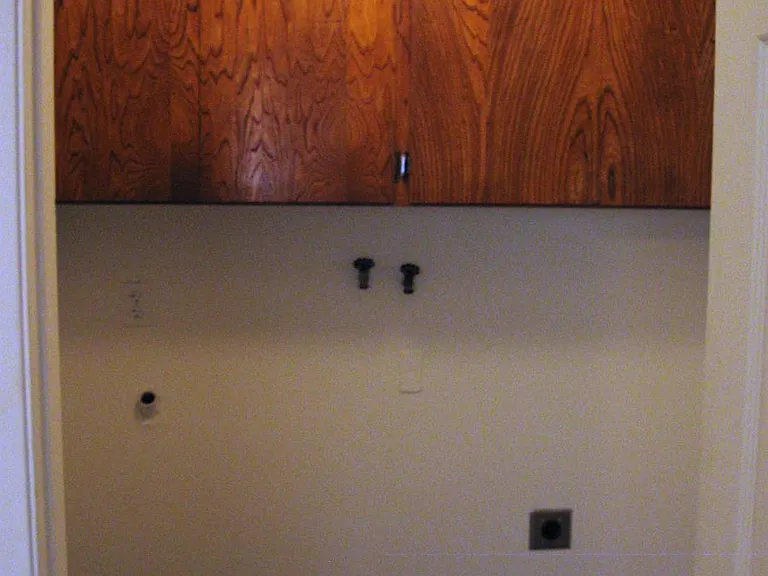 washer and dryer hookup, cupboards