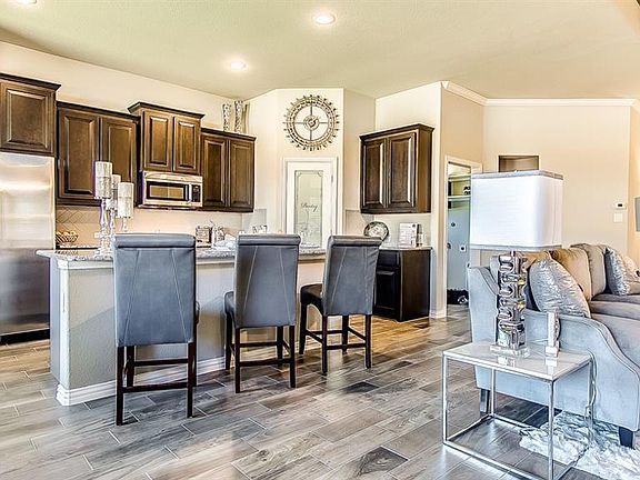 Photos shown here may not depict the specified home & features included are for illustration purposes only.