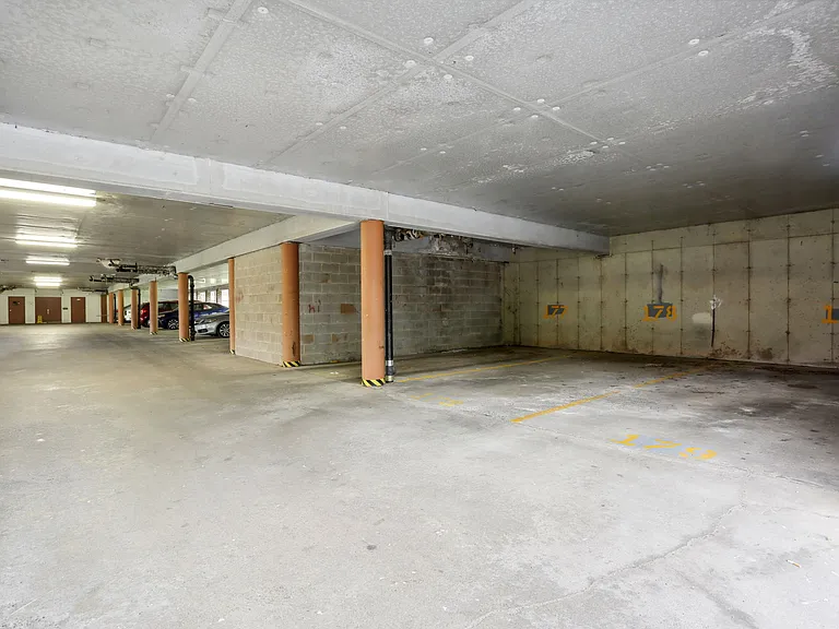 THIS UNIT OFFERS 2 PARKING ASSIGNED 1 IS COVERED IN THIS GARAGE AREA., AND THE OTHER IS EXTERIOR OUTSIDE ASSIGNED SPOT