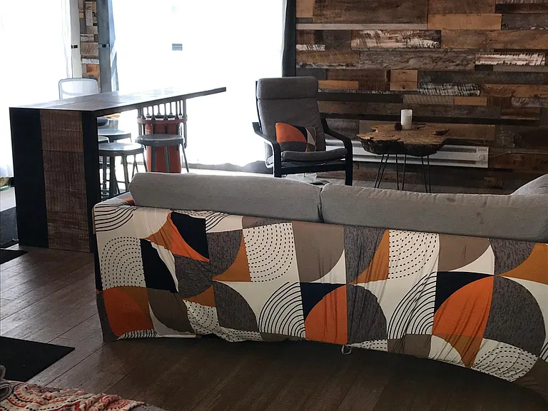 Studio set up with living area near kitchen