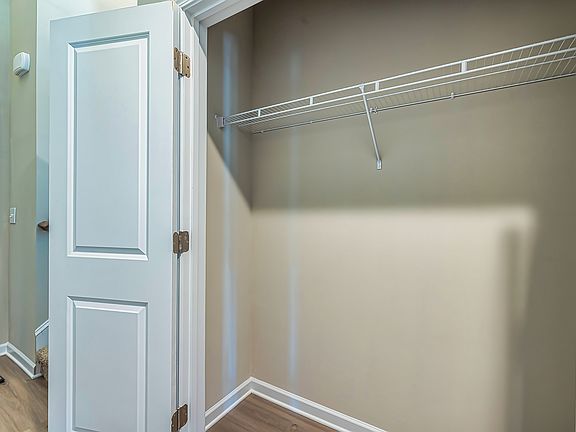 Ample storage at your fingertips: The entry closet offers generous space, ensuring you have all the room you need to stay organized.