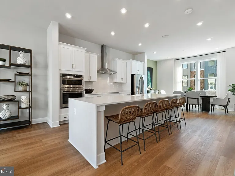 Open floor plan kitchen with 8 foot island