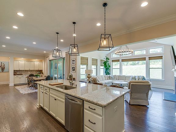 Kitchen opens to Living Room