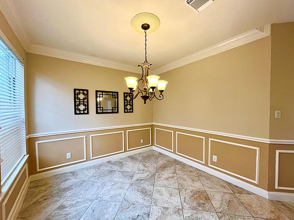 Formal dining on the left of foyer