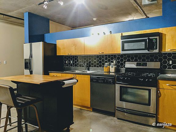 Kitchen with updated backsplash.
