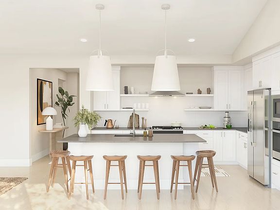 Kitchen with floating shelves and pendant lighting