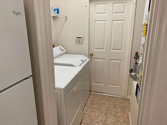 Washer. Gas dryer. Gas water heater. Gas heat. Garage entry into laundry room for easy access to kitchen.