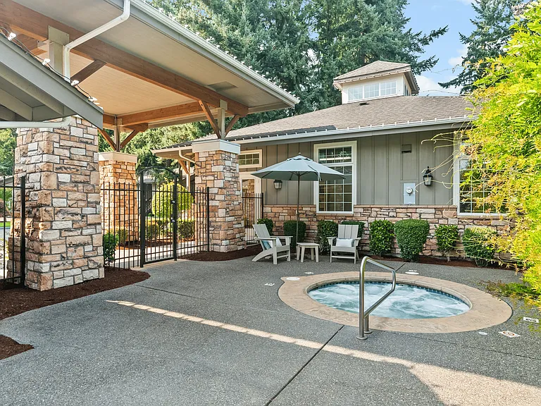Relax and unwind in our community spa with comfortable seating.