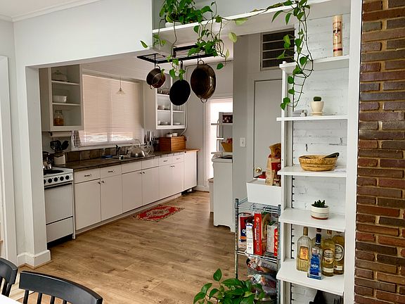View from sunny dining room into sunny kitchen!