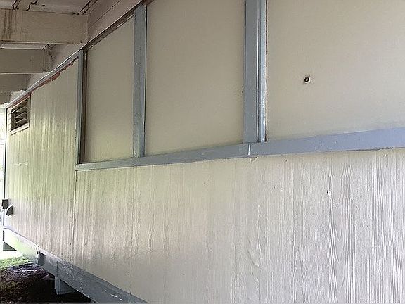 Side of carport storm window