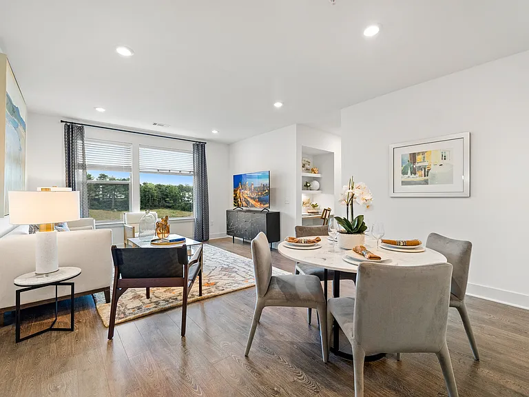 Open-concept living and modern wide-plank wood-style flooring