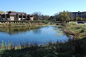 Pond with view of Clubhouse