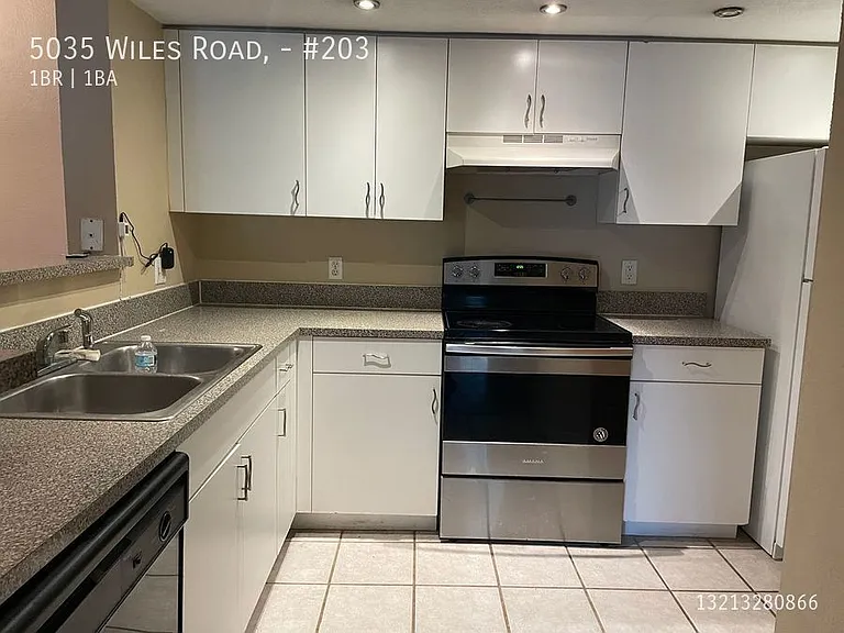 5035 Wiles Rd #203 — Photo 3