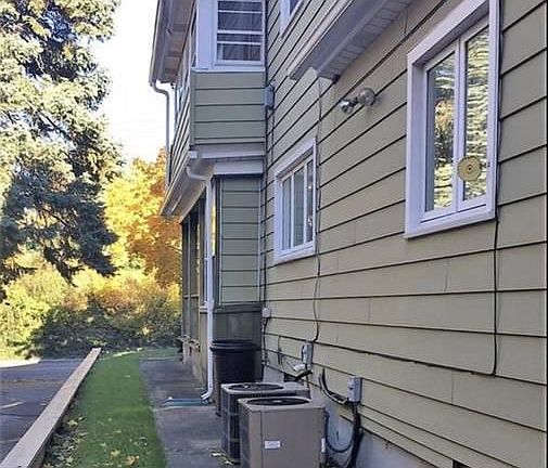 Side of House & A/C Units