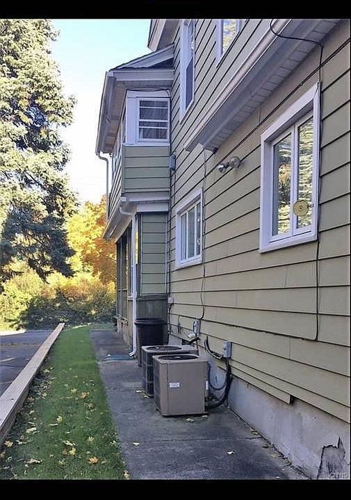 Side of House & A/C Units