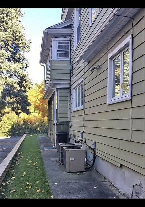 Side of House & A/C Units