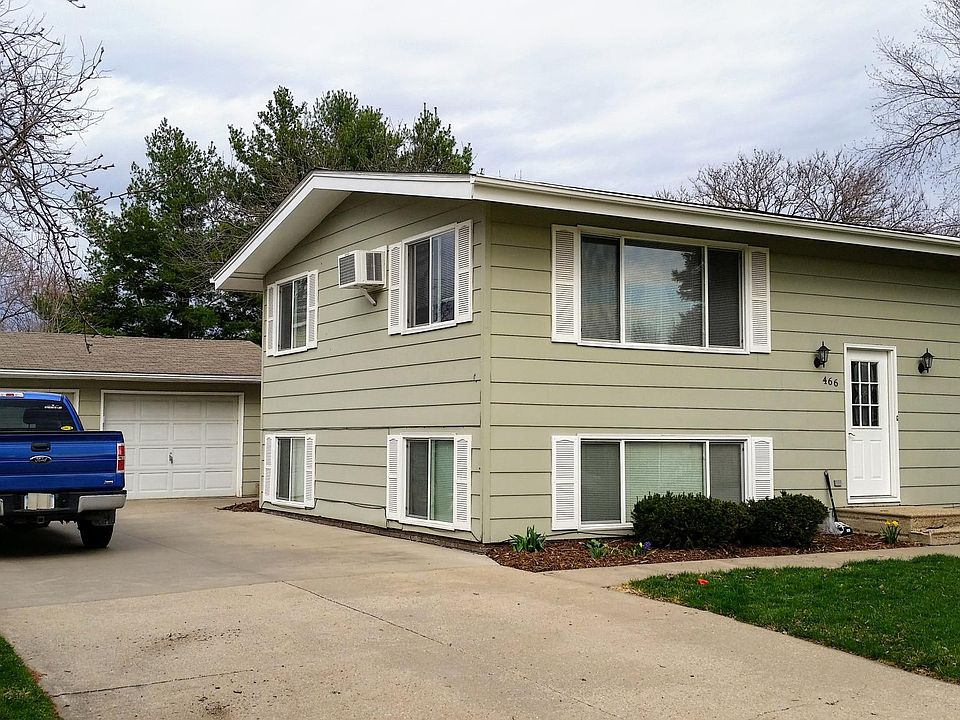 Private entry in front, garage on the left with off-street parking.