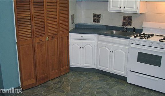 Kitchen (closet on left houses water heater and furnace)