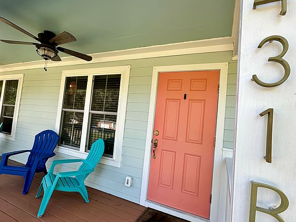Enjoy the shared covered porch on the front of the house, as well as your private sun-filled deck off the back of the house