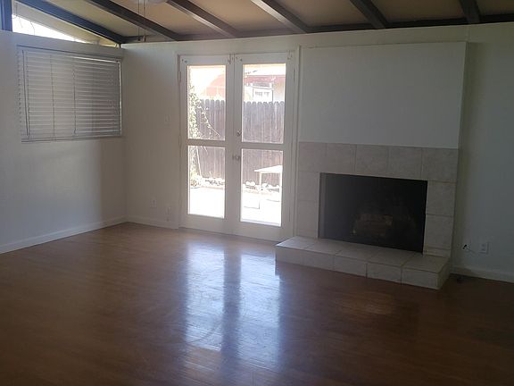 Fireplace and entrance to back yard