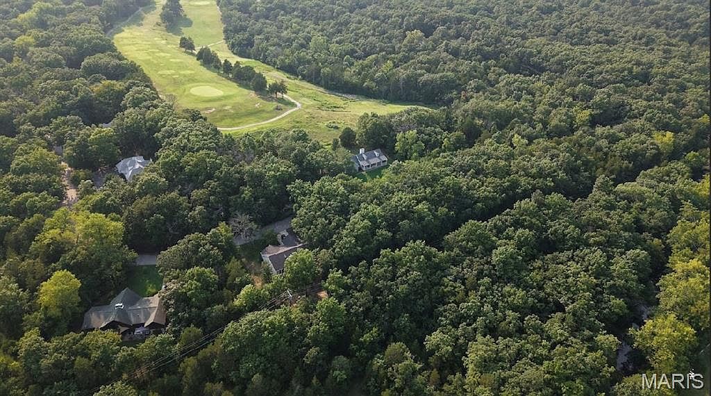 LOT 62//5728 Treebrook Dr — Raintree Country Club