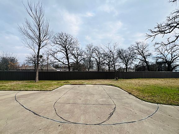 Additional two car parking area, also has been marked for a basketball goal.