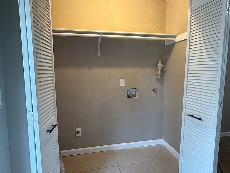 Laundry closet in kitchen
