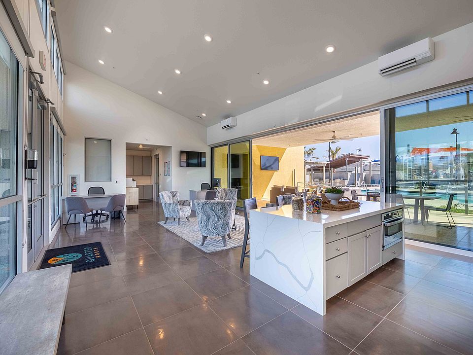 Experience contemporary elegance in this inviting open-concept living area, perfect for entertaining.