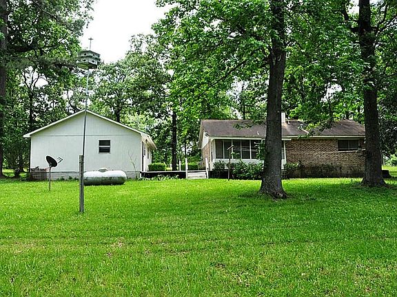 View of the back of the home and detached garage.