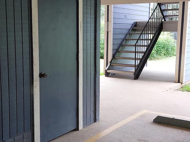 Stairs to unit and downstairs storage