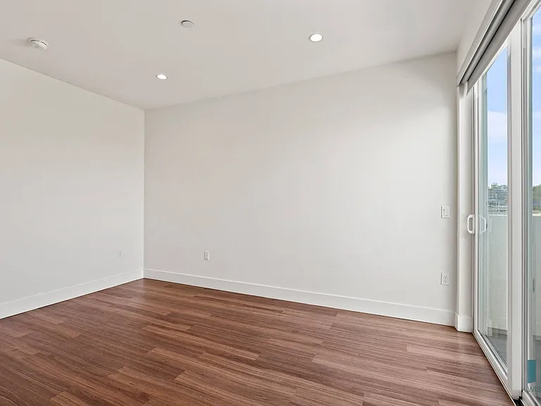 Living Room with Recessed Lighting, Vinyl Flooring, and Patio