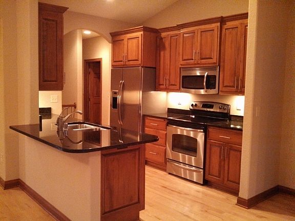 Kitchen w/ granite tops