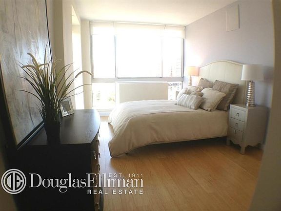 2nd image of 310 E 2nd St APT 9E