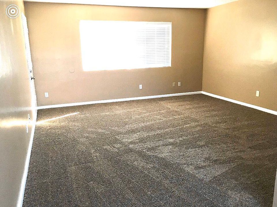 New paint, new blinds and new carpet in living room