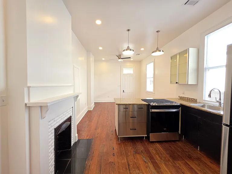 Great NOLA home characteristics - high ceilings, wood floors, fireplace (non-working)