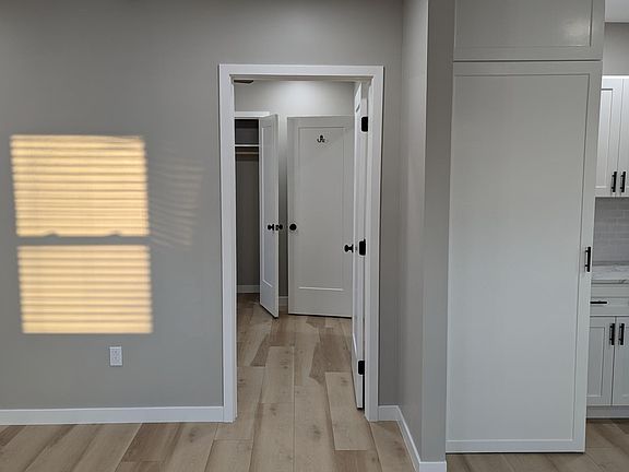 Living room center looking into bedroom