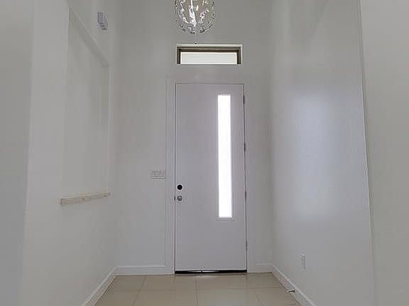 2nd image of 9312 N Queen Palm