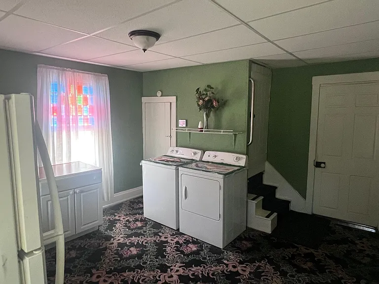 1st floor laundry, W/D included, office space, large extra fridge, closet
