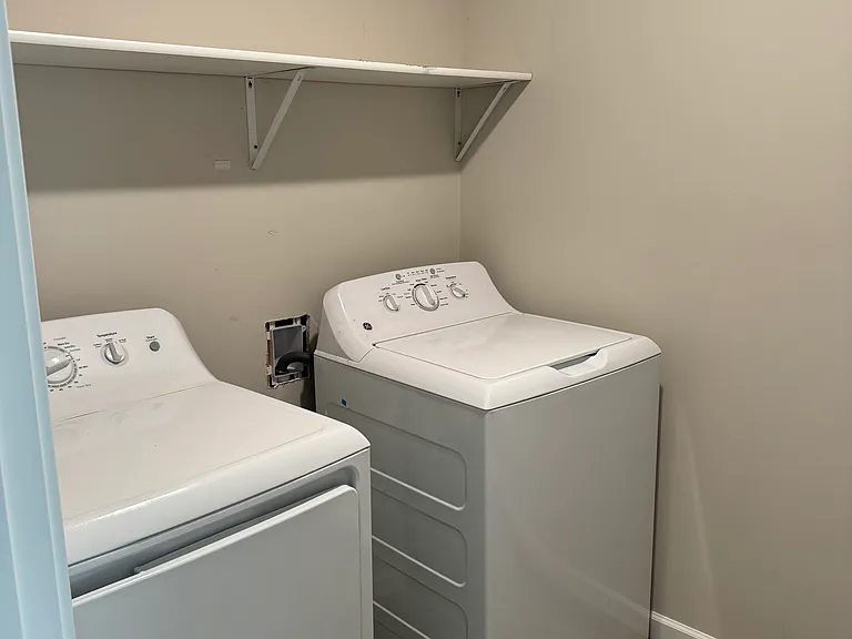 Laundry room. Same appliances but located in the mechanical room
