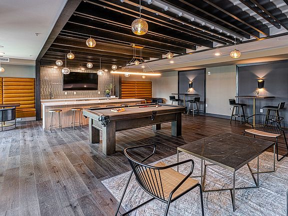 Host a few friends for a round of pool or crack open a good book in the club room
