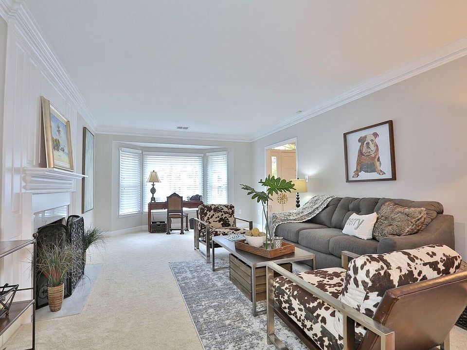 Large Living Room with a fireplace with a gas starter