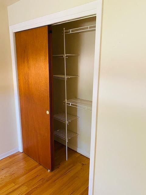 Closet organizers in both bedroom closets