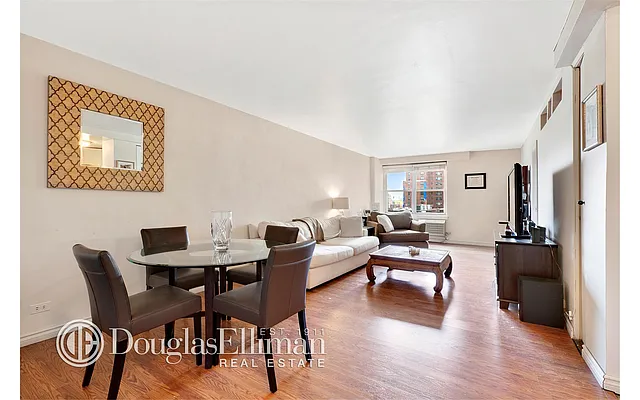 Sold by Douglas Elliman | media 18
