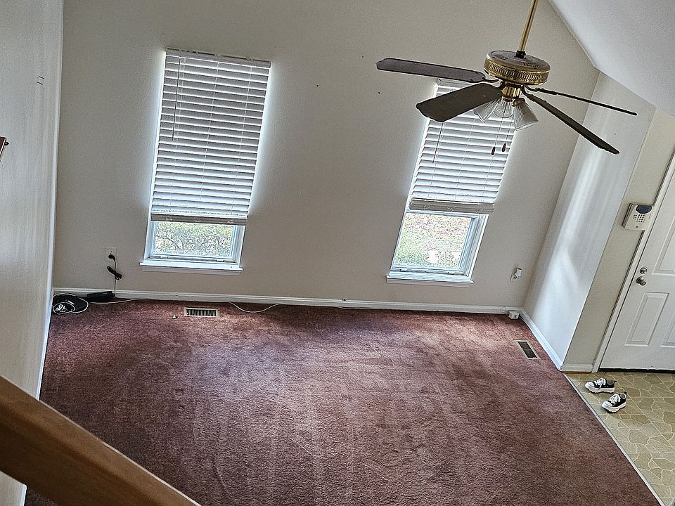 Top of the stairs overlooking living room.