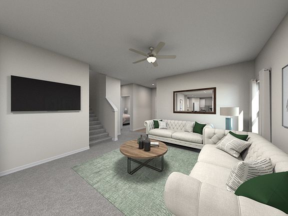 Kick your feet up after a long day in your cozy living space.