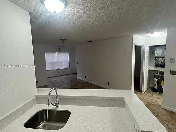 2nd image of 3450 Pinewalk Dr N APT 425