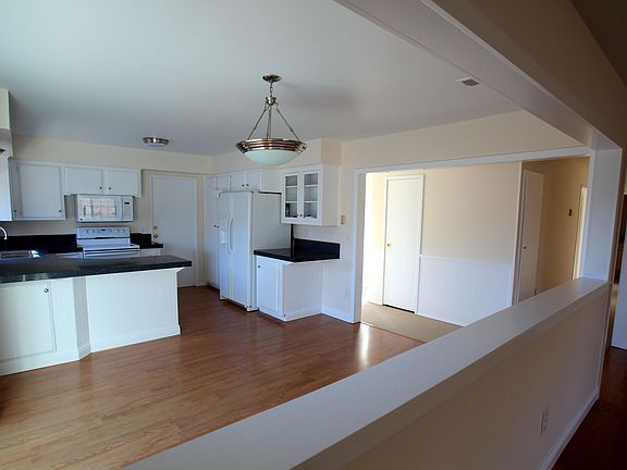 view to kitchen, dining, entry & hall