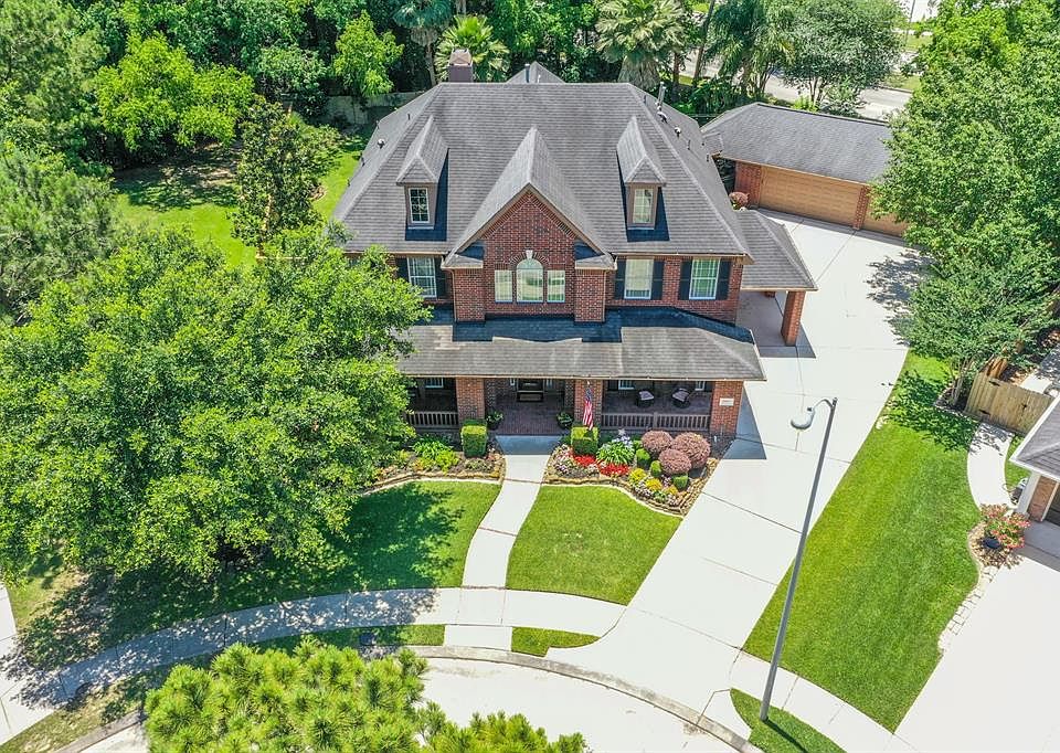 Enjoy the bird's eye view of this stunning home in the heart of Eagle Springs. The home is surrounded by trees on an oversized cul-de-sac lot. It is in close proximity to Eagle Springs Elementary, the Eagle Springs clubhouse, pool, tennis courts and 