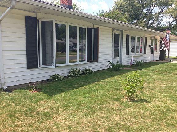 Front of house with large front yard