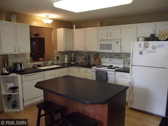 Kitchen looks out to Dining Room.